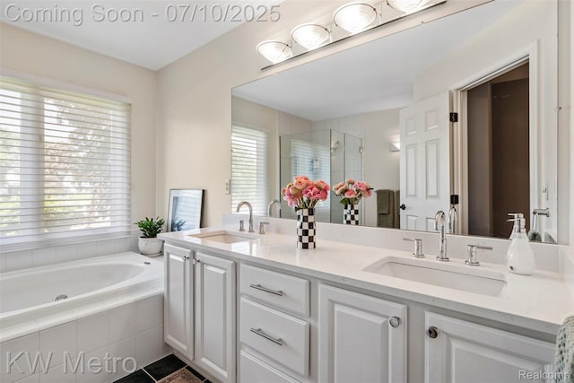 510 Roxbury Dr, Lake Orion, MI 48359 - full bath with double vanity, a shower stall, a bath, and tile patterned flooring