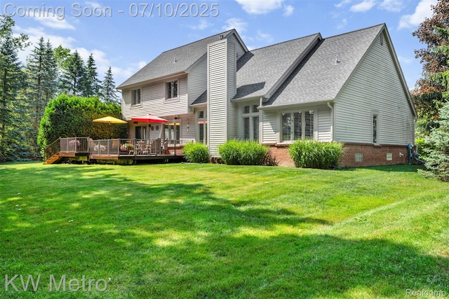 510 Roxbury Dr, Lake Orion, MI 48359 - rear view of house featuring a wooden deck, a lawn, and a shingled roof