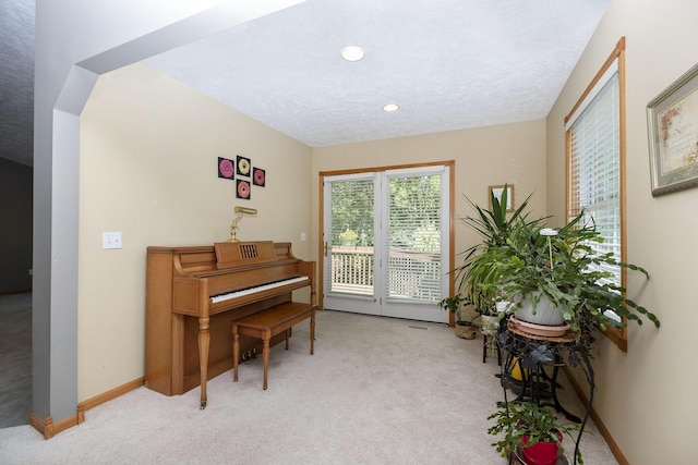6177 Heathcross Dr, Hudsonville, MI 49426 - living area with light carpet, recessed lighting, and a textured ceiling