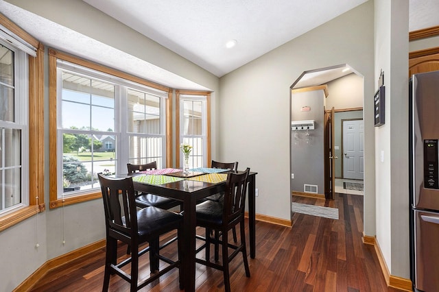 6177 Heathcross Dr, Hudsonville, MI 49426 - dining space featuring dark wood-style flooring, healthy amount of natural light, and recessed lighting