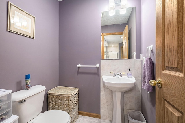 6177 Heathcross Dr, Hudsonville, MI 49426 - half bath with toilet and tile patterned flooring
