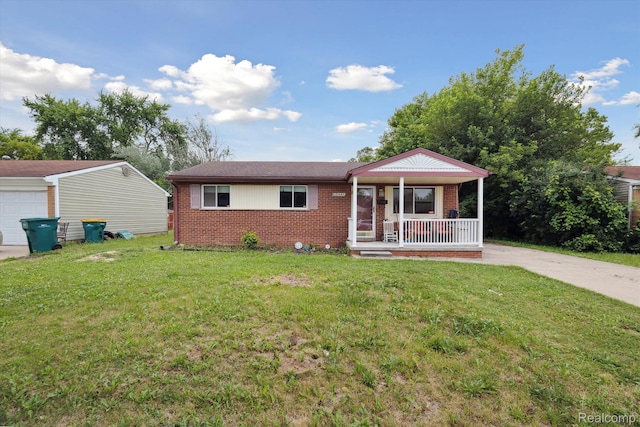15447 Taft St, Westland, MI 48174 - single story home featuring covered porch, brick siding, a front lawn, a garage, and concrete driveway