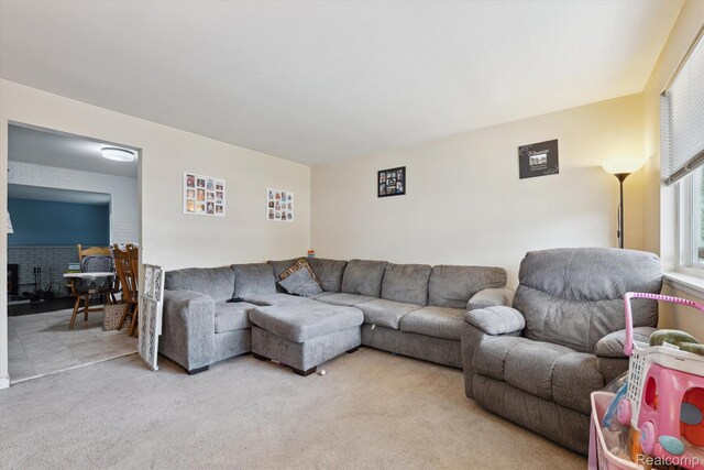 15447 Taft St, Westland, MI 48174 - living room featuring carpet floors and a fireplace