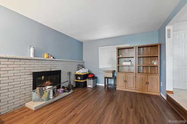 15447 Taft St, Westland, MI 48174 - living area with wood finished floors and a fireplace