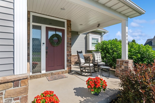 6044 Wabash Ln, Stevensville, MI 49127 - property entrance featuring stone siding and covered porch