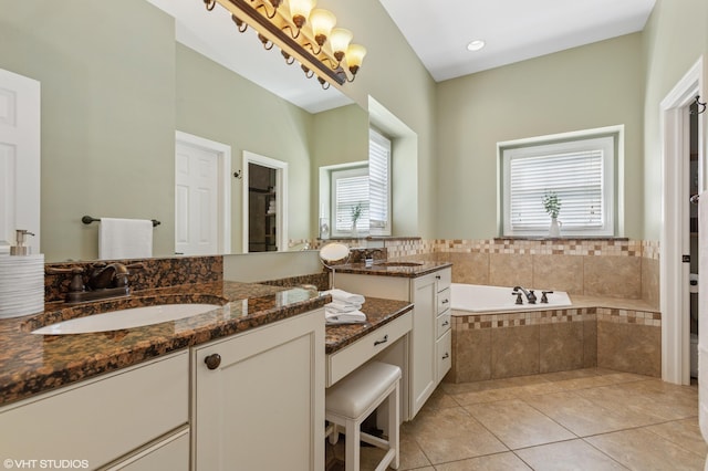 6044 Wabash Ln, Stevensville, MI 49127 - full bath featuring healthy amount of natural light, tile patterned floors, a bath, and vanity