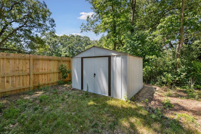 3049 Kooi St, Muskegon, MI 49444 - view of shed with a fenced backyard