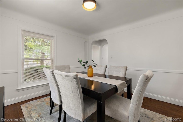 18714 Appoline St, Detroit, MI 48235 - dining space with arched walkways and wood finished floors