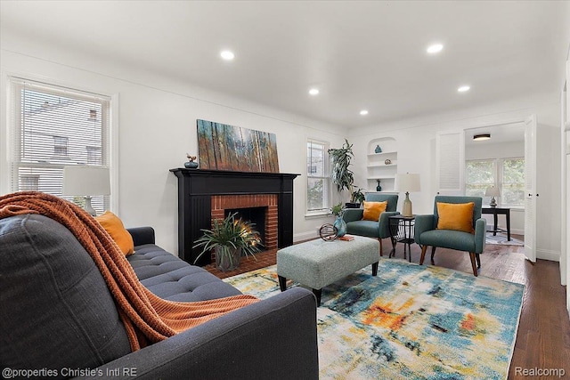 18714 Appoline St, Detroit, MI 48235 - living room featuring recessed lighting, wood finished floors, and a fireplace
