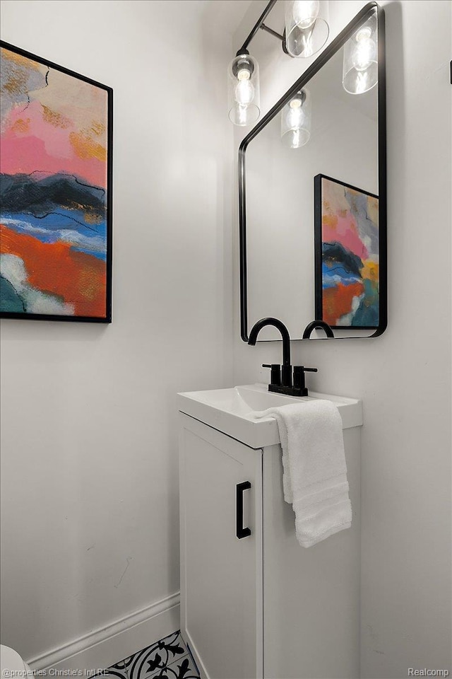 18714 Appoline St, Detroit, MI 48235 - half bathroom featuring vanity and baseboards