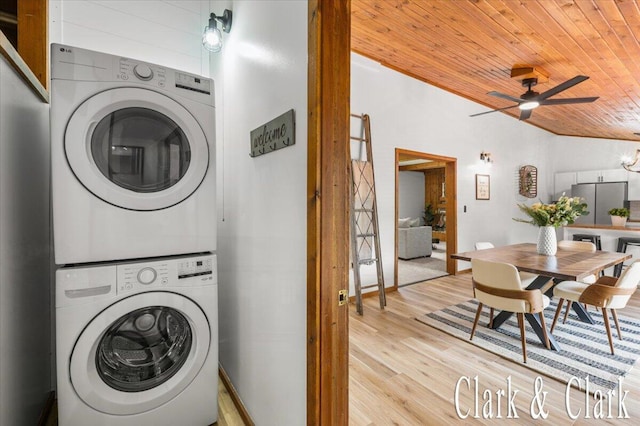 139 W Grand Ledge Hwy, Sunfield, MI 48890 - washroom featuring estacked washer and dryer, wood ceiling, light wood-style flooring, and a ceiling fan
