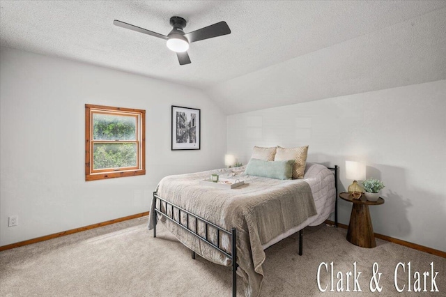 139 W Grand Ledge Hwy, Sunfield, MI 48890 - bedroom featuring carpet floors, vaulted ceiling, a textured ceiling, and a ceiling fan