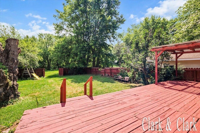 139 W Grand Ledge Hwy, Sunfield, MI 48890 - wooden deck with a fenced backyard