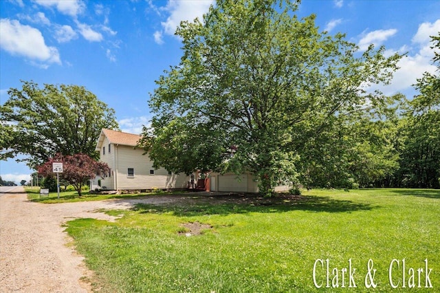 139 W Grand Ledge Hwy, Sunfield, MI 48890 - view of grassy yard featuring driveway