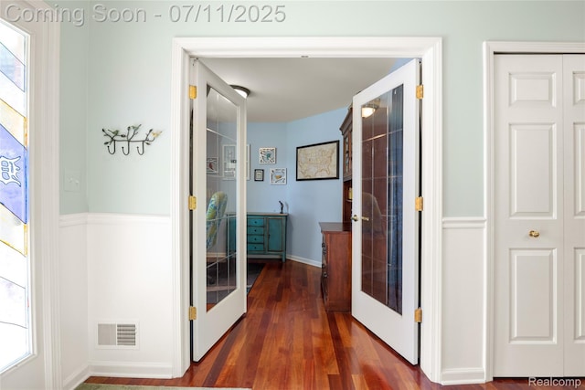 52221 Giuliano Ln, Macomb, MI 48042 - corridor with french doors and dark wood finished floors