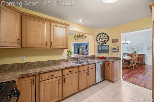 52221 Giuliano Ln, Macomb, MI 48042 - kitchen featuring stainless steel dishwasher, range, recessed lighting, dark countertops, and a chandelier