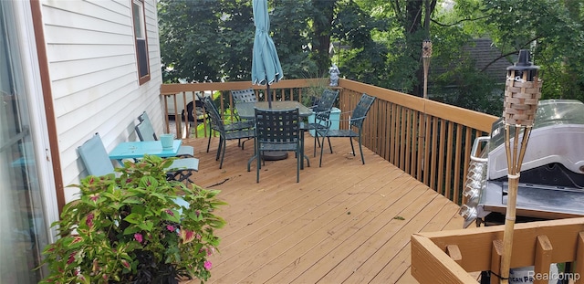 507 Main St, Fenton, MI 48430 - deck featuring outdoor dining area