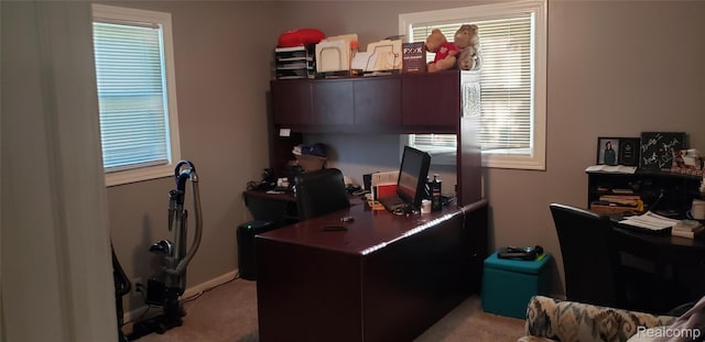 507 Main St, Fenton, MI 48430 - home office with light colored carpet and plenty of natural light