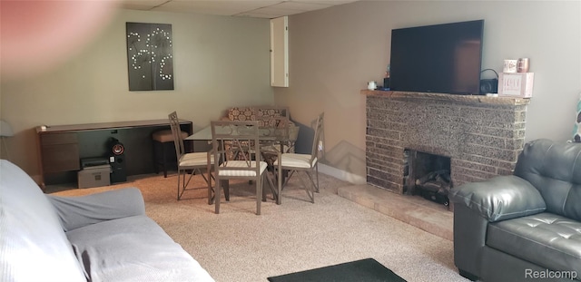 507 Main St, Fenton, MI 48430 - carpeted living room with a brick fireplace and a paneled ceiling