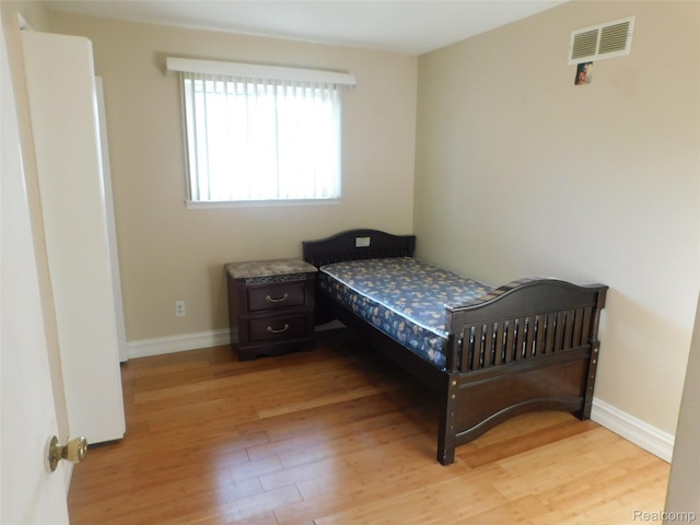 2238 Nadine Dr, Sterling Heights, MI 48310 - bedroom with light wood-style flooring