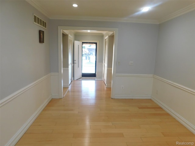 2238 Nadine Dr, Sterling Heights, MI 48310 - hallway with light wood finished floors, ornamental molding, recessed lighting, and a wainscoted wall
