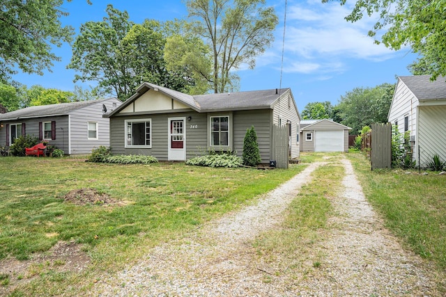 340 Nora St SE, Grand Rapids, MI 49548 - view of front of house with driveway and a garage