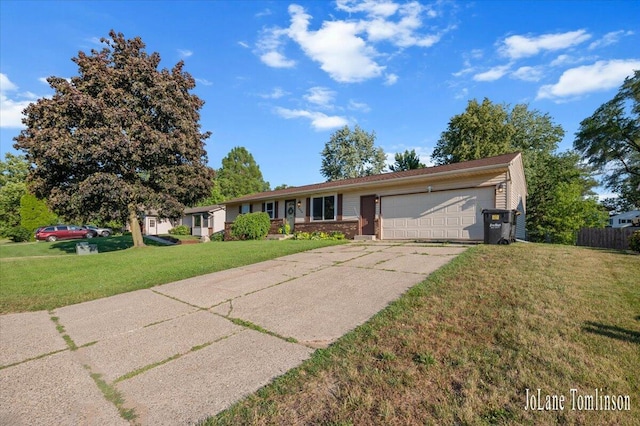 2958 Bluewater Ln SW, Grandville, MI 49418 - single story home with an attached garage, a front yard, and concrete driveway