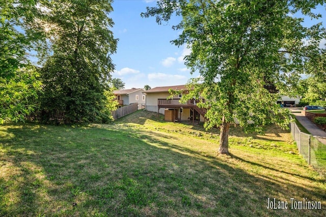 2958 Bluewater Ln SW, Grandville, MI 49418 - view of yard with a deck and stairs