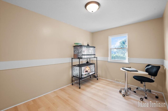 2958 Bluewater Ln SW, Grandville, MI 49418 - home office with wood finished floors and baseboards