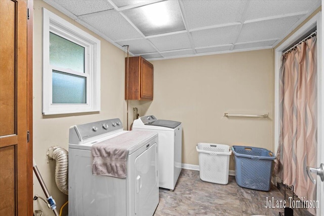 2958 Bluewater Ln SW, Grandville, MI 49418 - laundry room featuring cabinet space and independent washer and dryer