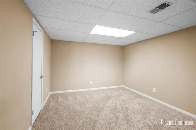 2958 Bluewater Ln SW, Grandville, MI 49418 - empty room with carpet flooring and a paneled ceiling