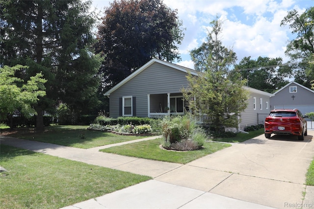 6500 Cooper St, Taylor, MI 48180 - view of front of house featuring a front yard and covered porch