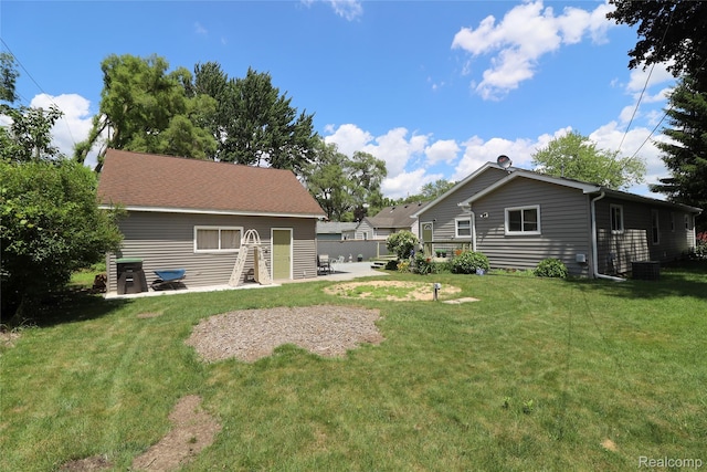 6500 Cooper St, Taylor, MI 48180 - rear view of property with a lawn