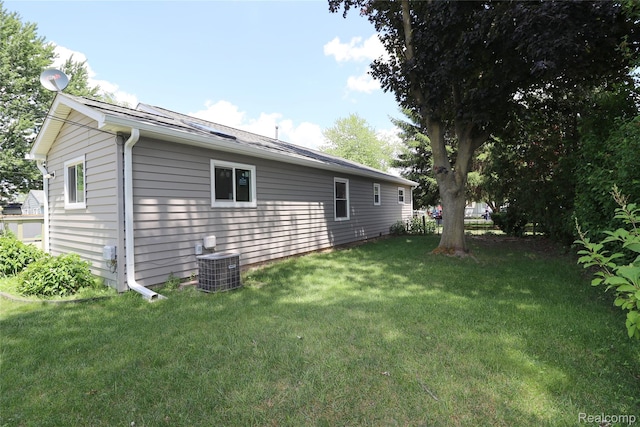 6500 Cooper St, Taylor, MI 48180 - view of property exterior with a central air condition unit and a lawn