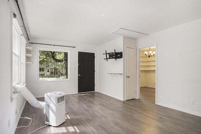 165 Kenton St SE, Grand Rapids, MI 49548 - entryway featuring a chandelier and wood finished floors