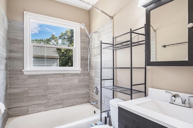 165 Kenton St SE, Grand Rapids, MI 49548 - bathroom featuring tub / shower combination and vanity