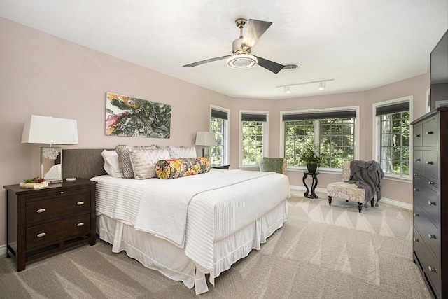 106 Kingsbury Ct, Battle Creek, MI 49015 - carpeted bedroom featuring baseboards and a ceiling fan