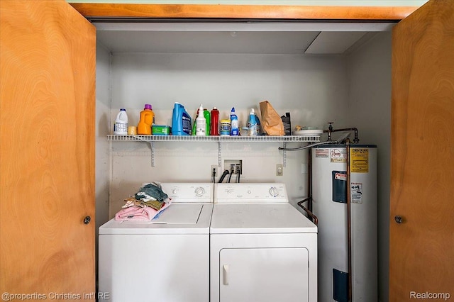 4681 Cass Elizabeth Rd, Waterford, MI 48327 - washroom with water heater and washing machine and clothes dryer
