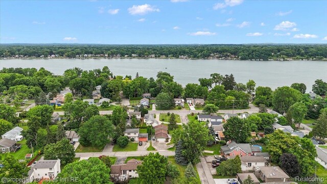 4681 Cass Elizabeth Rd, Waterford, MI 48327 - aerial perspective of suburban area with a large body of water
