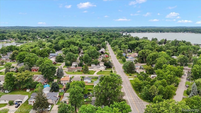 4681 Cass Elizabeth Rd, Waterford, MI 48327 - aerial perspective of suburban area featuring a large body of water and a forest