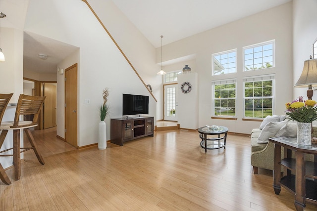 270 Silver Ridge Dr, Holland, MI 49424 - living room with a high ceiling and light wood finished floors