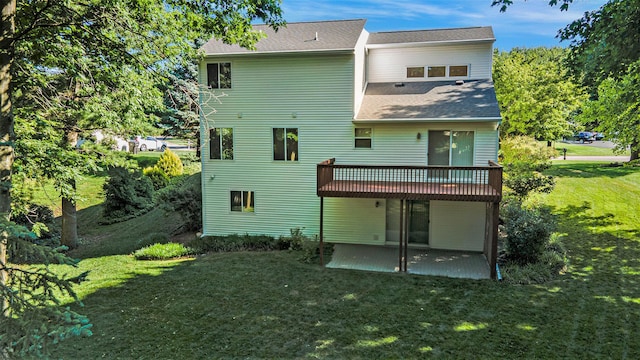 270 Silver Ridge Dr, Holland, MI 49424 - back of property featuring a patio, a yard, a deck, and a shingled roof