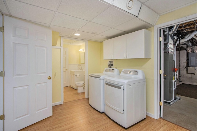 5625 Bay Meadow Trl, Portage, MI 49024 - laundry area with cabinet space, separate washer and dryer, light wood-style floors, electric panel, and recessed lighting