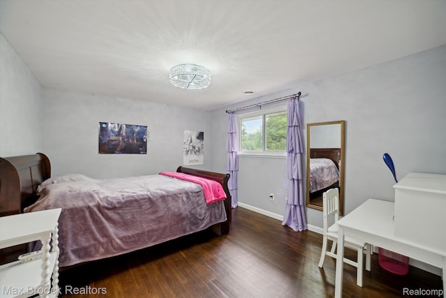 6810 Killarney Dr, Troy, MI 48098 - bedroom with wood finished floors and baseboards