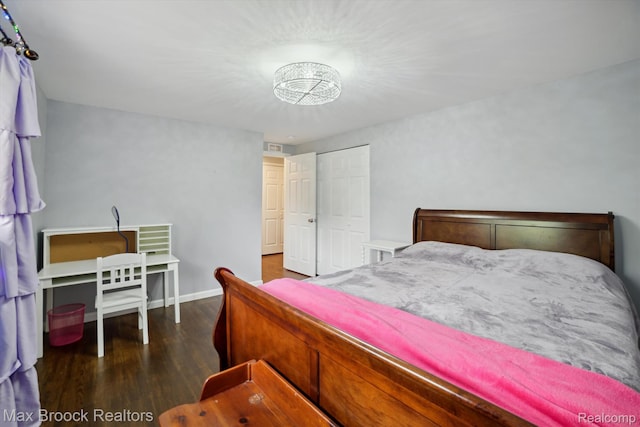 6810 Killarney Dr, Troy, MI 48098 - bedroom with wood finished floors and a closet