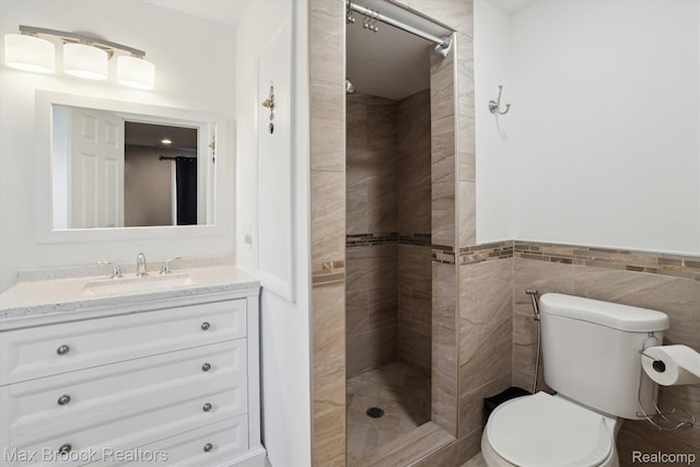 6810 Killarney Dr, Troy, MI 48098 - full bathroom with a stall shower, vanity, and tile walls