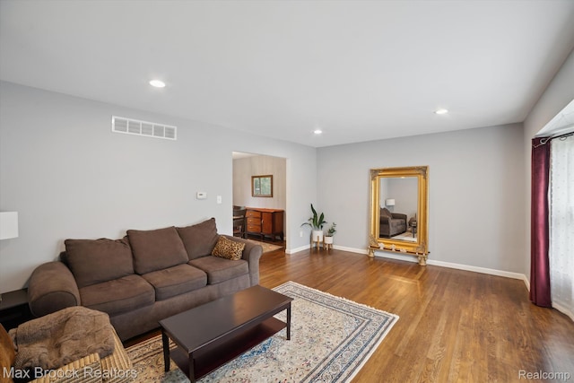 6810 Killarney Dr, Troy, MI 48098 - living area featuring wood finished floors and recessed lighting