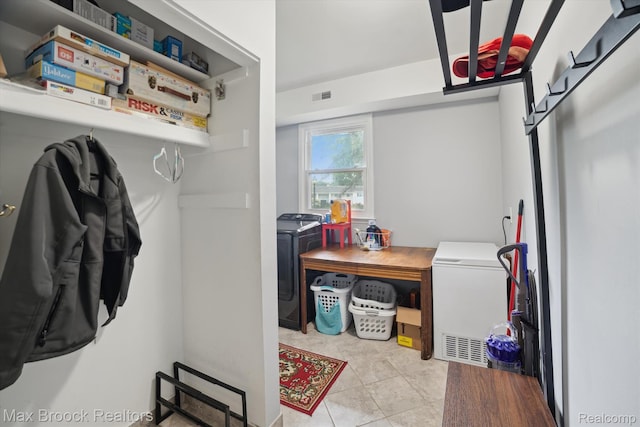 6810 Killarney Dr, Troy, MI 48098 - washroom featuring washing machine and clothes dryer and tile patterned floors