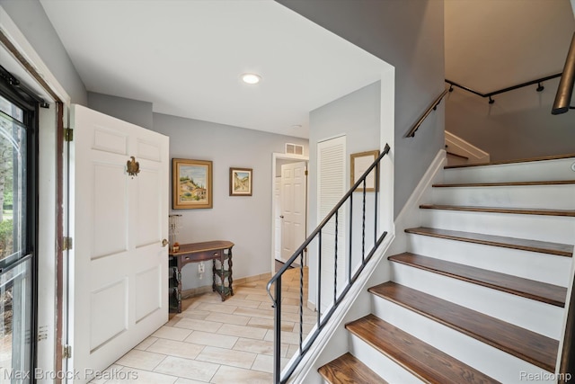 6810 Killarney Dr, Troy, MI 48098 - foyer entrance with stairway and recessed lighting