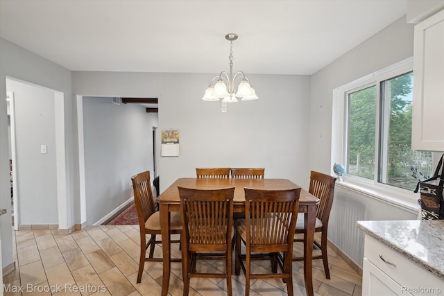 6810 Killarney Dr, Troy, MI 48098 - dining space featuring a chandelier and light wood finished floors